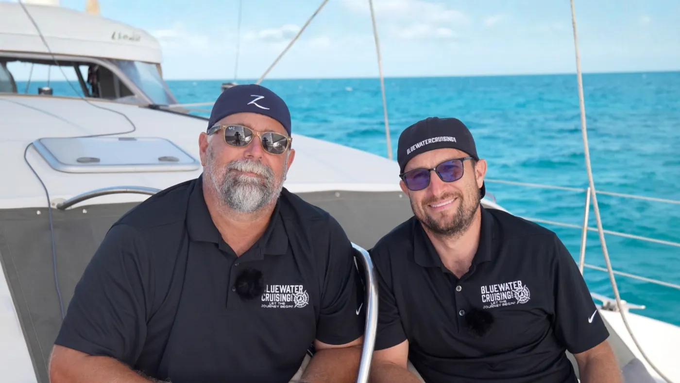 Chris Biasutti and Keith Whitaker aboard a Bluewater Cruising catamaran
