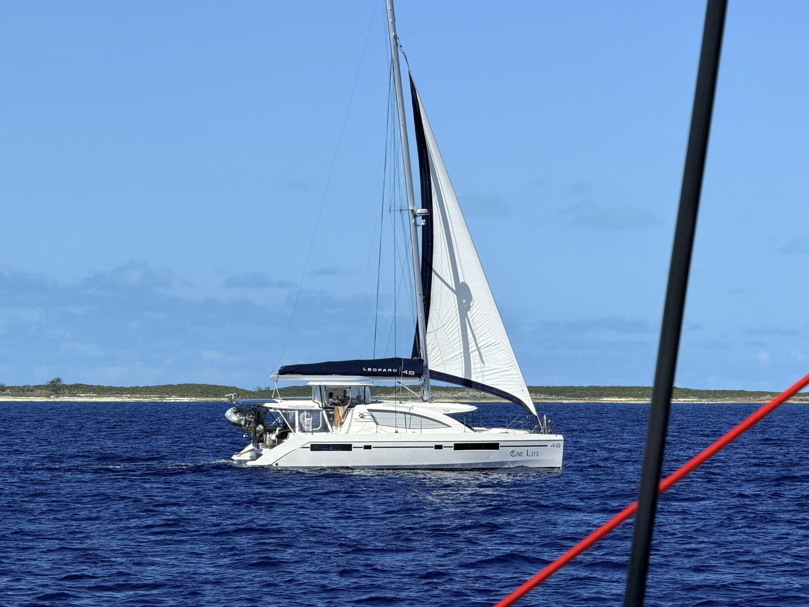 One Life, a Leopard 48 sail catamaran, under sail