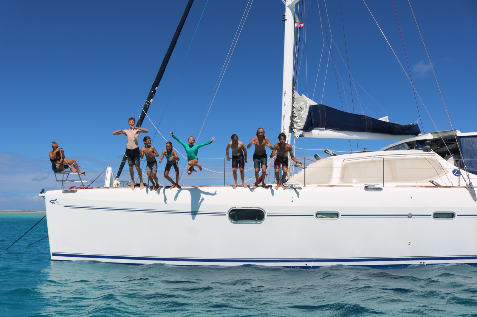 The crew jumping off the bow of Zatara